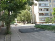 В Днепродзержинске экономят асфальт при ремонте дорог дороги