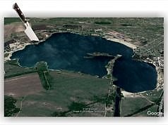 Прокурори нарізали собі по 2 гектари лісу на березі Блакитного озера